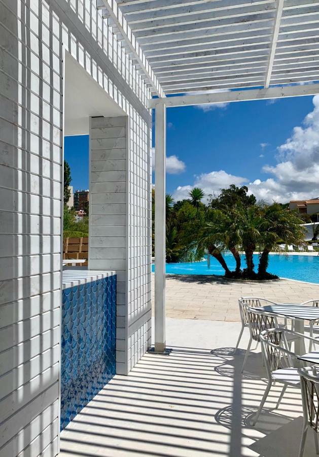 Malibu Foz Hotel - La Maison Younan Figueira da Foz Exteriör bild The pool at the hotel