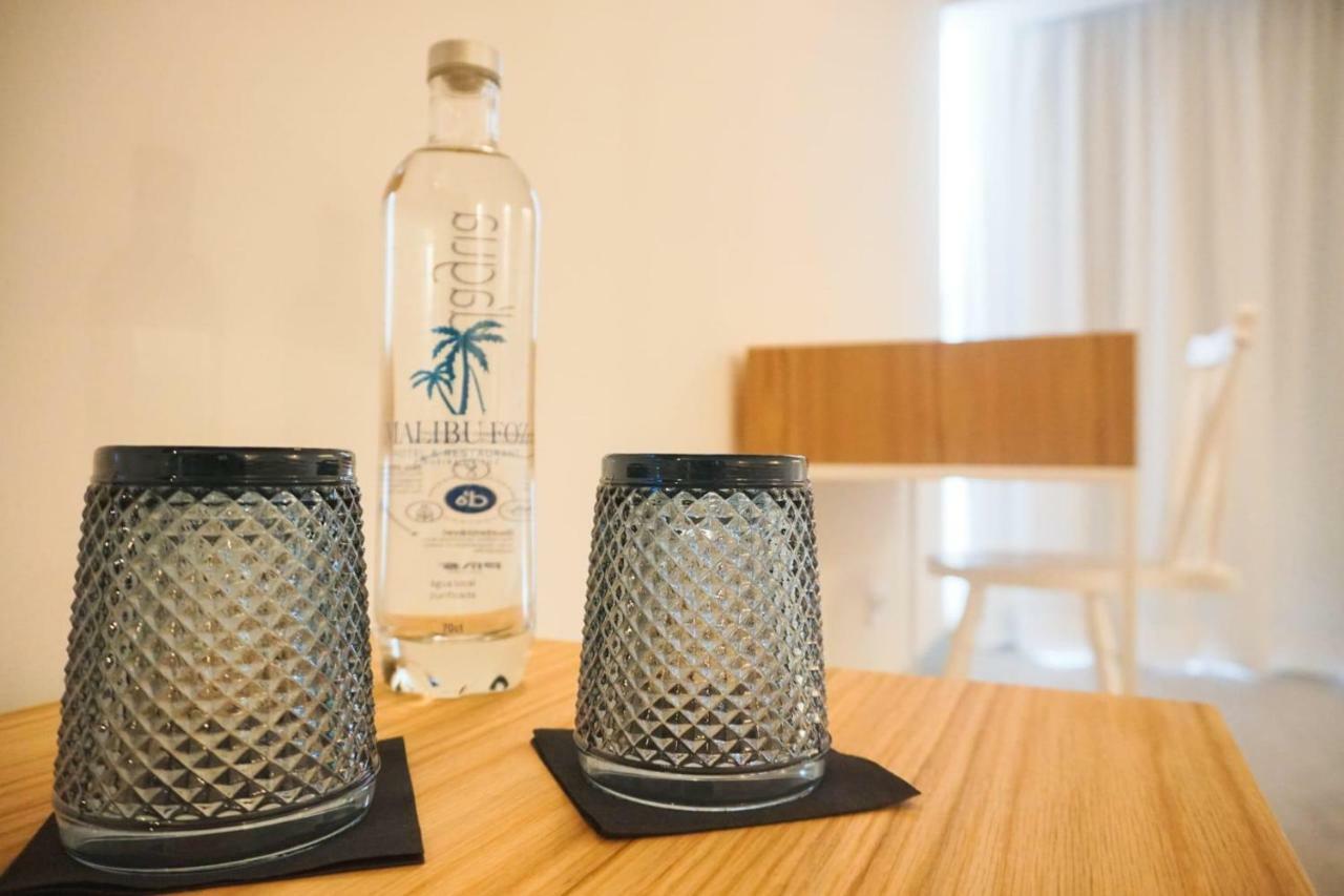 Malibu Foz Hotel - La Maison Younan Figueira da Foz Exteriör bild A bottle of water