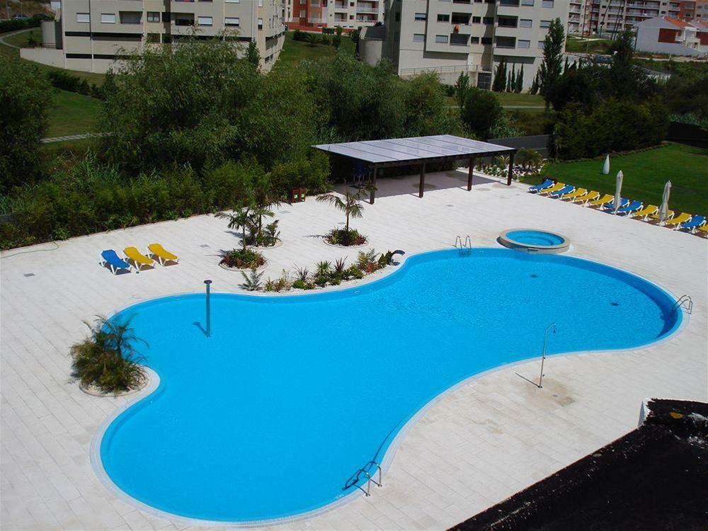 Malibu Foz Hotel - La Maison Younan Figueira da Foz Exteriör bild Swimming pool in the complex