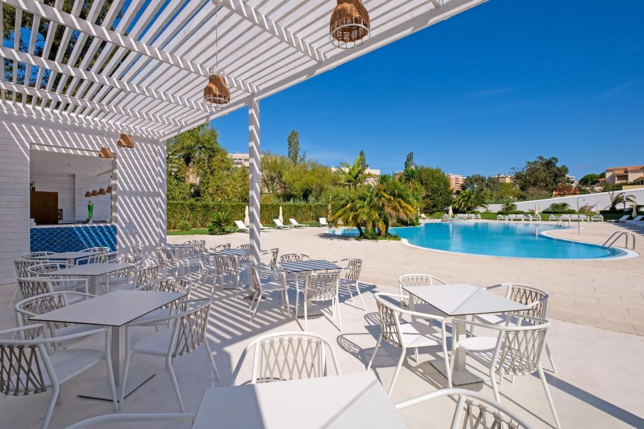 Malibu Foz Hotel - La Maison Younan Figueira da Foz Exteriör bild The pool at the hotel
